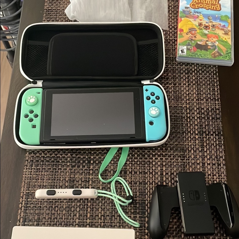 Brand new Nintendo switch - animal crossing version - MUST GO WITHIN THE WEEK!